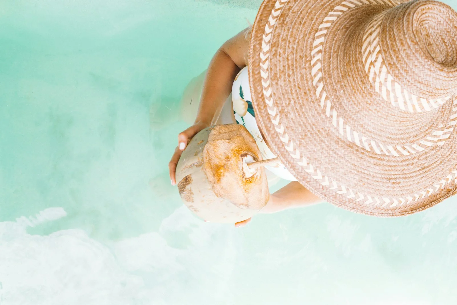 person holding coconut